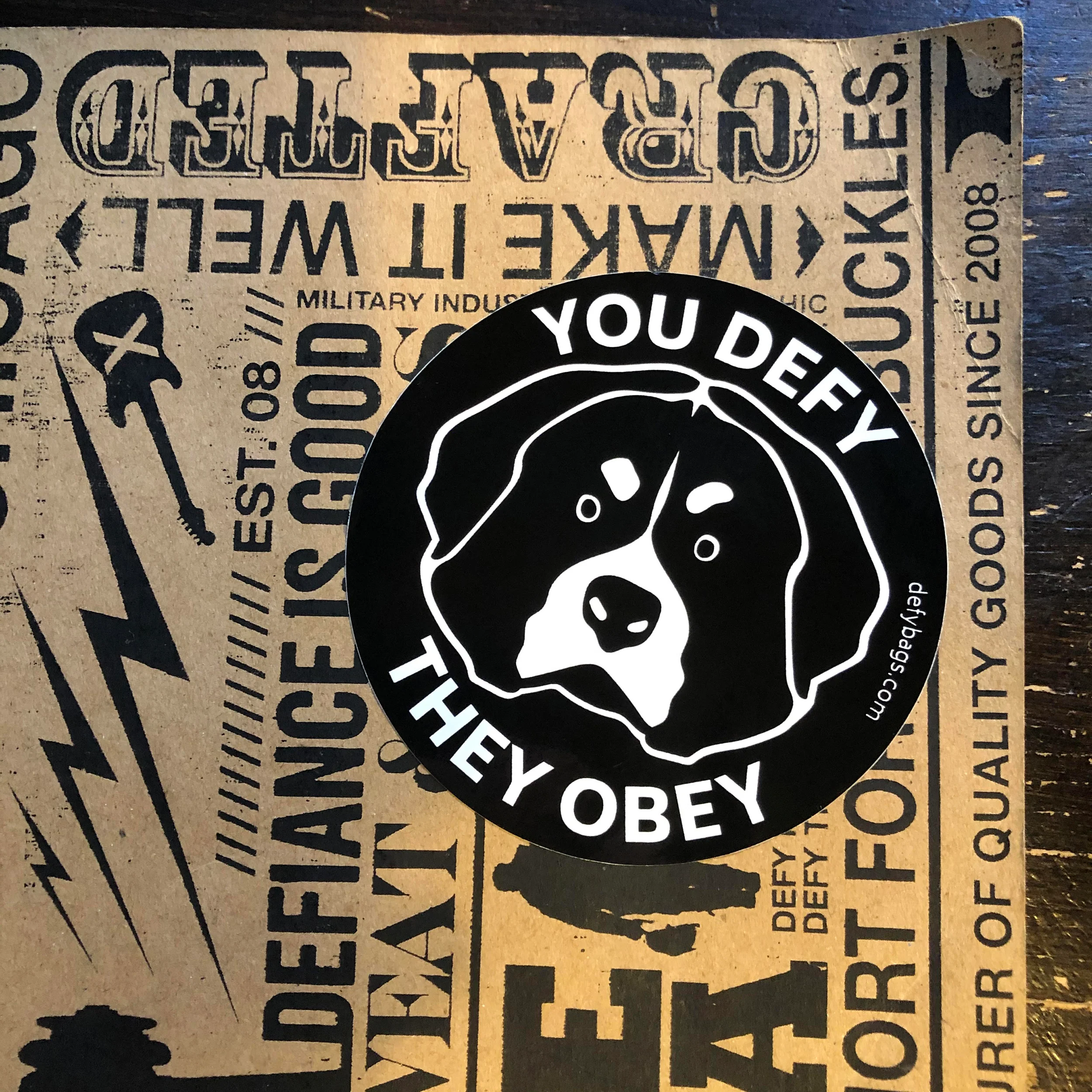 YOU DEFY, THEY OBEY | The Otis Sticker | White on Black - Image 3
